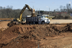 Dirt is being removed at the UpTown Suites construction site off Weddington Road near Speedway Blvd. in Concord, NC.