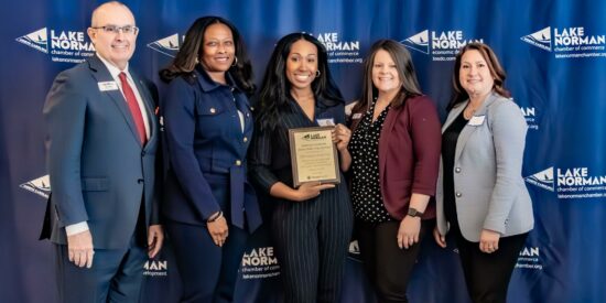 Mrs. Kimberly Courtland, of Merancas Middle College High School, (center) is recognized as the 2024 Educator of the Year for Charlotte Mecklenburg Schools. Also pictured is  Chamber Chair Jeff Tarte, Jametta Martin-Tanner Principal, along with Brandi Jones co-chair of the Chamber’s Education Collaborative, and former Huntersville Mayor Melinda Bales. Photo: Ocaid Photography